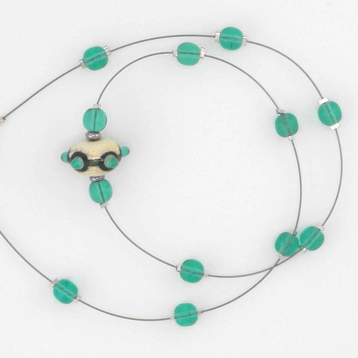 green and ivory lampwork floating necklace