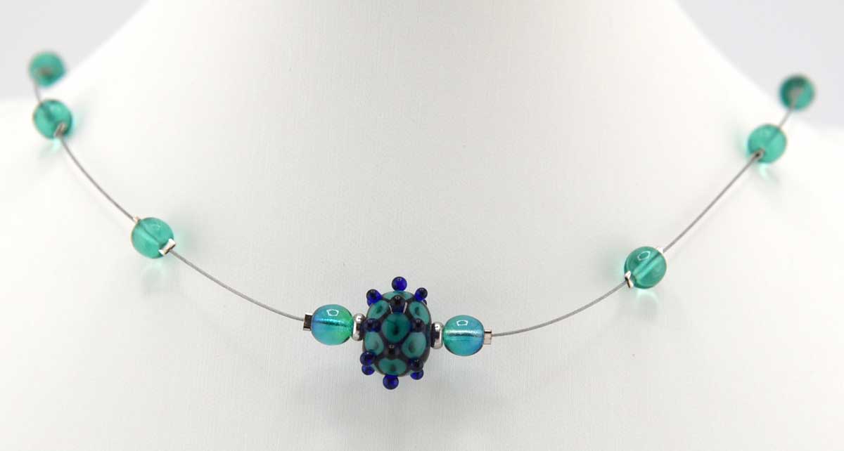 green lampwork floating necklace